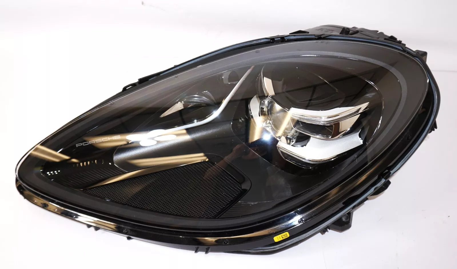 OEM 2019-2021 Porsche Macan LED Left Headlight, showcasing sleek design and bright illumination for enhanced visibility and safety.