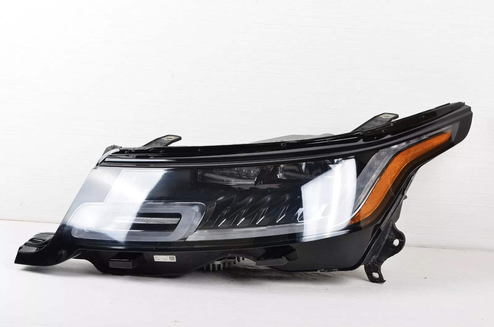 OEM LED headlight for 2018-2022 Land Rover Range Rover Sport, left driver side view.
